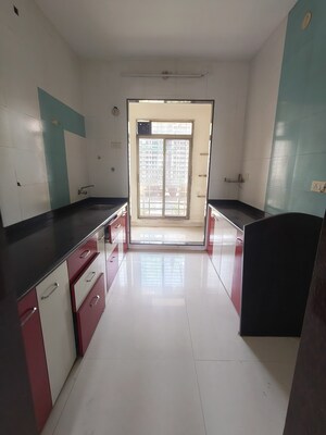 Kitchen in 3 BHK Apartment at Millenium Icon Apartment, Kharghar – for Rent