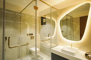 Bathroom in 4 BHK Apartment at Khanpur – for Sale