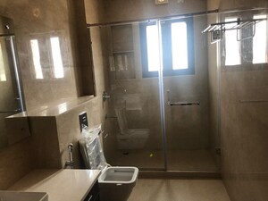 Bathroom in 5 BHK Apartment at Vasant Vihar – for Rent