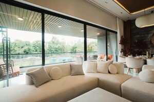 Living Room in 4 BHK Apartment at Khanpur – for Sale