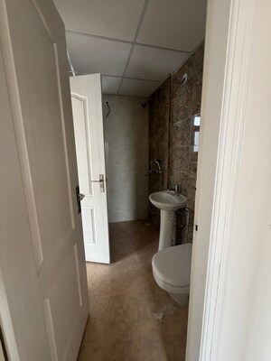 Building Lobby in 2.5 BHK Apartment at Amrapali Silicon City, Sector 76 – for Sale