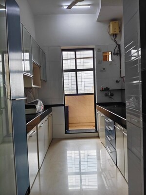 Kitchen in 2 BHK Apartment at K Raheja Heights, Malad East – for Rent