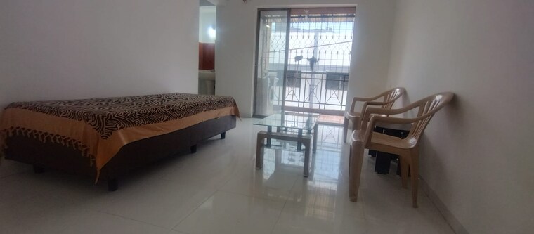 Living Room, magarpatta-city-roystonea 3 Bedroom 1200 Sq.Ft. Apartment In Hadapsar Pune 10651865