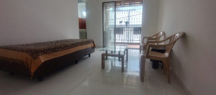 Living Room, magarpatta-city-roystonea 3 Bedroom 1200 Sq.Ft. Apartment In Hadapsar Pune 10651865