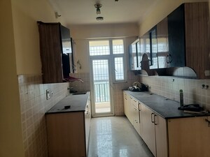Kitchen in 2.5 BHK Apartment at Saviour Greenisle, Sain Vihar – for Sale
