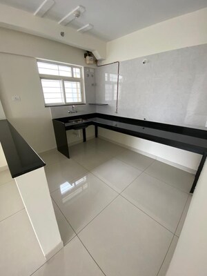 Kitchen in 2 BHK Apartment at Beharay Rathi Hillview Residency, Kothrud – for Rent