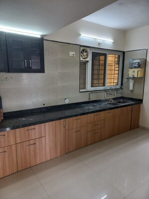 Kitchen in 2 BHK Apartment at Rising Landscapes, Mohammadwadi – for Rent