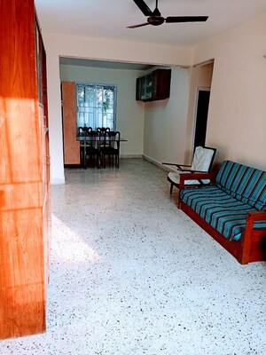 Living Room in 2 BHK Apartment at Shantiban CHS, Kothrud – for Rent