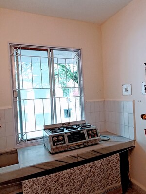 Kitchen in 2 BHK Apartment at Shantiban CHS, Kothrud – for Rent