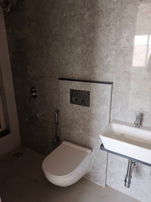 Bathroom in 1 BHK Apartment at Omkar Signet, Malad East – for Rent