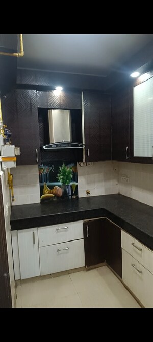 Kitchen in 2 BHK Apartment at Raj Nagar Extension – for Sale
