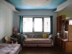 Living Room in 2 BHK Apartment at Woodland Apartments, Kothrud – for Rent