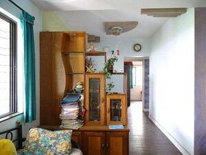 Living Room in 2 BHK Apartment at Woodland Apartments, Kothrud – for Rent