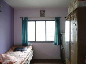 Bedroom in 2 BHK Apartment at Woodland Apartments, Kothrud – for Rent