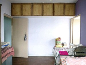 Bedroom in 2 BHK Apartment at Woodland Apartments, Kothrud – for Rent