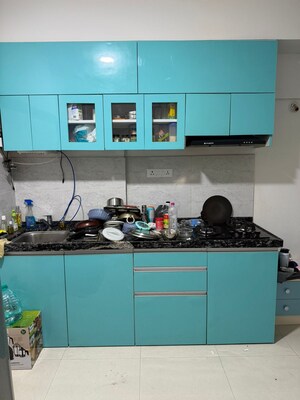 Kitchen in 1 RK Apartment at Gera World of Joy, Kharadi – for Rent