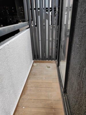 Balcony in 1 BHK Apartment at Dhamji Shamji Mahavir Spring Tulip Phase 1, Pokhran Road No Two – for Rent
