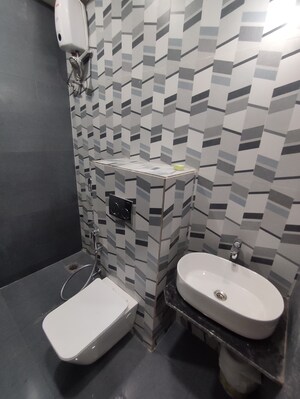 Bathroom in 1 BHK Apartment at Dhamji Shamji Mahavir Spring Tulip Phase 1, Pokhran Road No Two – for Rent