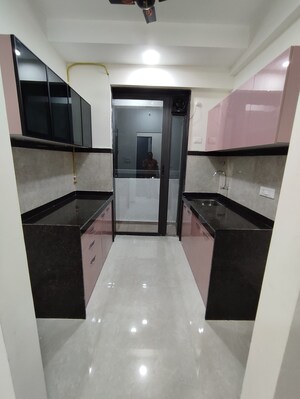 Kitchen in 1 BHK Apartment at Dhamji Shamji Mahavir Spring Tulip Phase 1, Pokhran Road No Two – for Rent