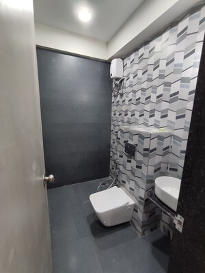 Bathroom in 1 BHK Apartment at Dhamji Shamji Mahavir Spring Tulip Phase 1, Pokhran Road No Two – for Rent