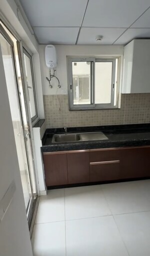 Kitchen in 2 BHK Apartment at Godrej Air Sector 85, Sector 85 – for Rent