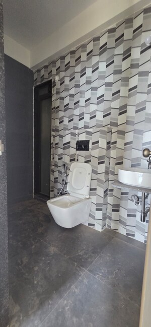 Bathroom in 2 BHK Apartment at Dhamji Shamji Mahavir Spring Tulip Phase 1, Pokhran Road No Two – for Rent