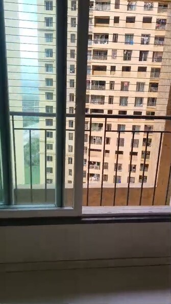 2 BHK +  670 Sq.Ft. Apartment in Rustomjee Azziano Wing K