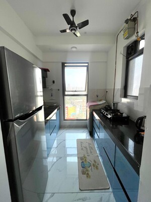 Kitchen in 2 BHK Apartment at Raymond Ten X Habitat, Pokhran Road No Two – for Rent