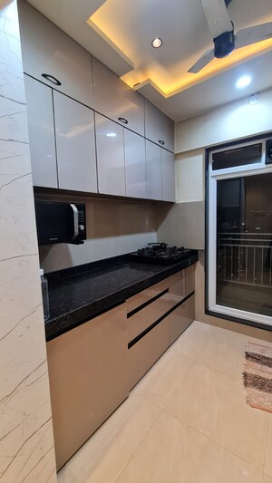Kitchen in 2 BHK Apartment at JP North Elara, Mira Road – for Sale