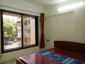 Room in 2 BHK Apartment at Hare Krishna CHS, Andheri East – for Rent