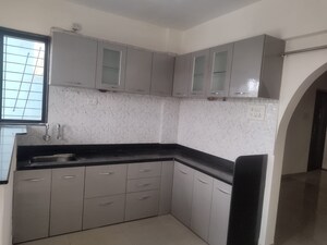 Kitchen in 2 BHK Apartment at Shree Paras Basera, Lohgaon – for Rent
