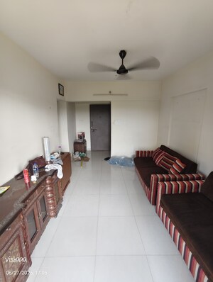 Living Room in 2 BHK Apartment at Goodwill Olive Residency, Owale – for Rent