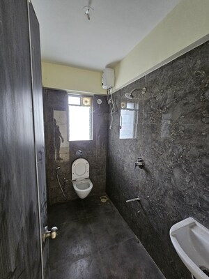 Bathroom in 2 BHK Apartment at Om Maruti Residency, Borivali West – for Sale