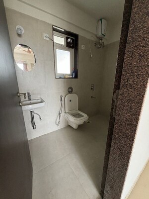 Bathroom in 2 BHK Apartment at Puranik City Reserva, Ghodbunder Road – for Rent