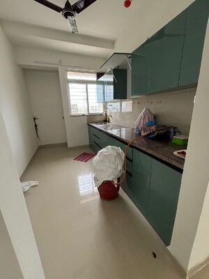 Kitchen in 2 BHK Apartment at Puranik City Reserva, Ghodbunder Road – for Rent