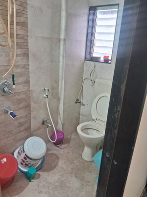 Bathroom in 1 BHK Apartment at Raunak City, Kalyan West – for Sale
