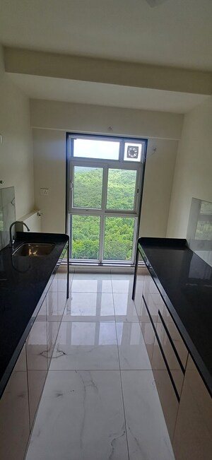 Kitchen in 2 BHK Apartment at MICL Aaradhya Parkwood, Mira Road – for Rent