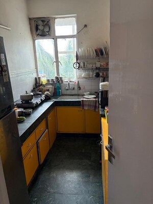 Kitchen in 2 BHK Apartment at Eros Southend Apartments, Charmwood Village – for Rent
