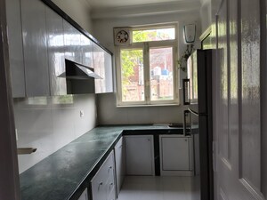 Kitchen in 2 BHK Apartment at Eros Sterling Apartments, Charmwood Village – for Sale