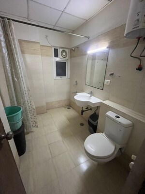 Bathroom in 3 BHK Apartment at JM Aroma, Sector 75 – for Rent