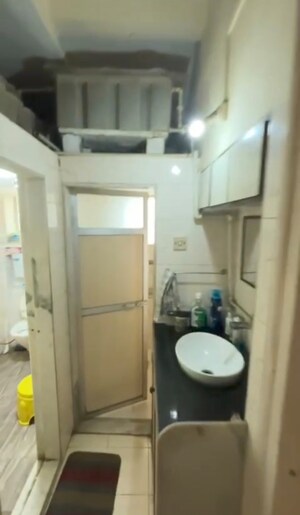 Bathroom in 1 BHK Apartment at Andheri Heights, Andheri East – for Rent