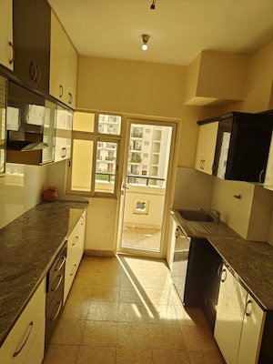 Kitchen in 3.5 BHK Apartment at DLF Westend Heights New Town, Akshayanagar – for Rent