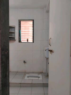 Bathroom in 2 BHK Apartment at Karve Nagar – for Rent