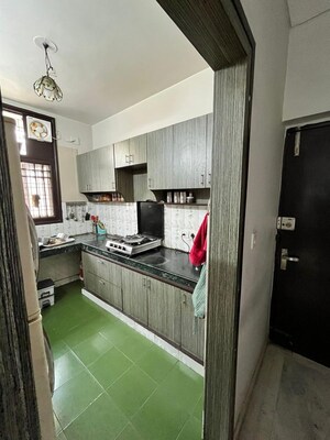 Kitchen in 4 BHK Builder Floor at Ansal Harmony Homes, Sector 57 – for Sale