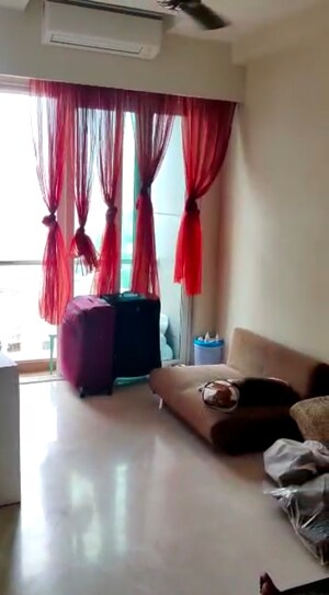 Living Room in 3 BHK Apartment at Transcon Flora Heights, Andheri West – for Rent