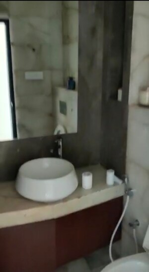 Bathroom in 3 BHK Apartment at Transcon Flora Heights, Andheri West – for Rent