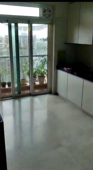 Kitchen in 3 BHK Apartment at Transcon Flora Heights, Andheri West – for Rent
