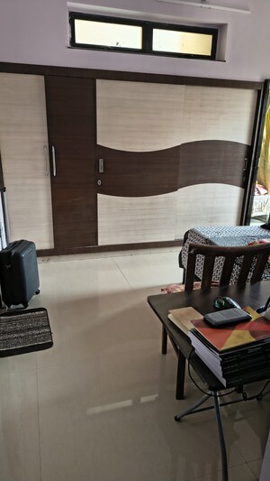 Living Room in 2 BHK Apartment at K Raheja Heights, Malad East – for Rent