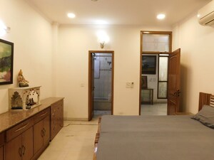 Bedroom in 3 BHK Builder Floor at Defence Colony – for Rent