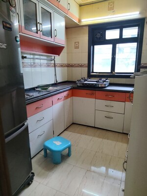 Kitchen in 2 BHK Apartment at Evershine Park, Andheri West – for Rent
